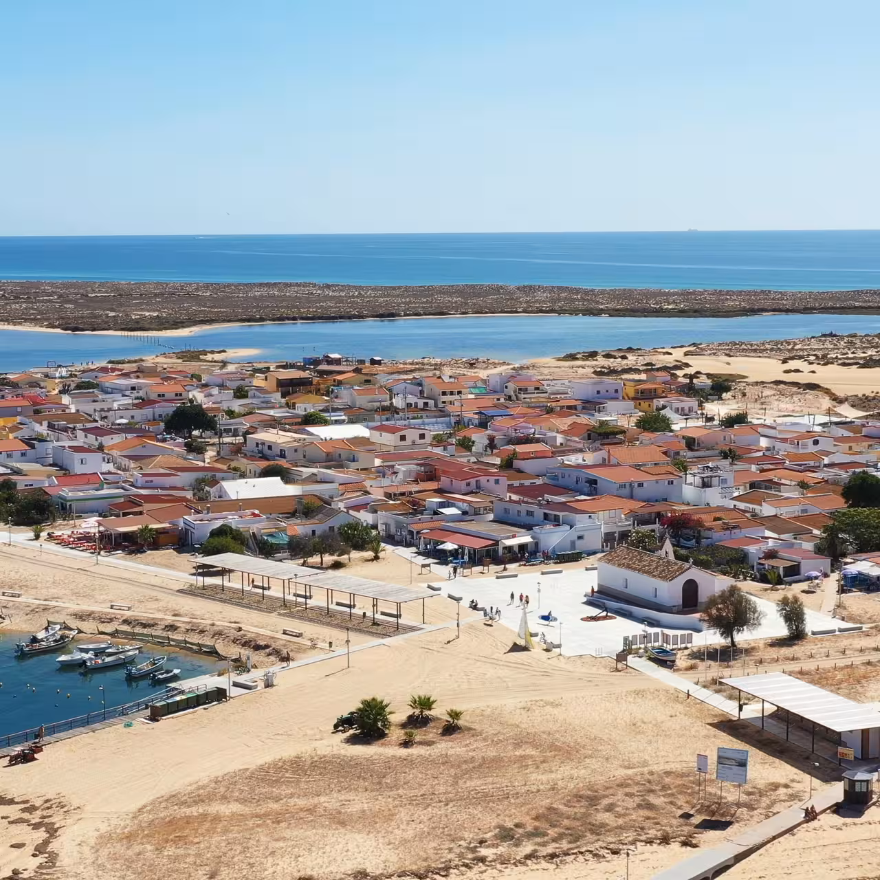 Panoramic view of Culatra Island village and lagoon, Algarve, visited on Armona and Culatra boat tour from Olhão