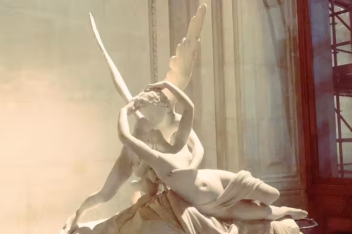 Marble sculpture of Cupid and Psyche embracing at the Louvre Museum, Paris