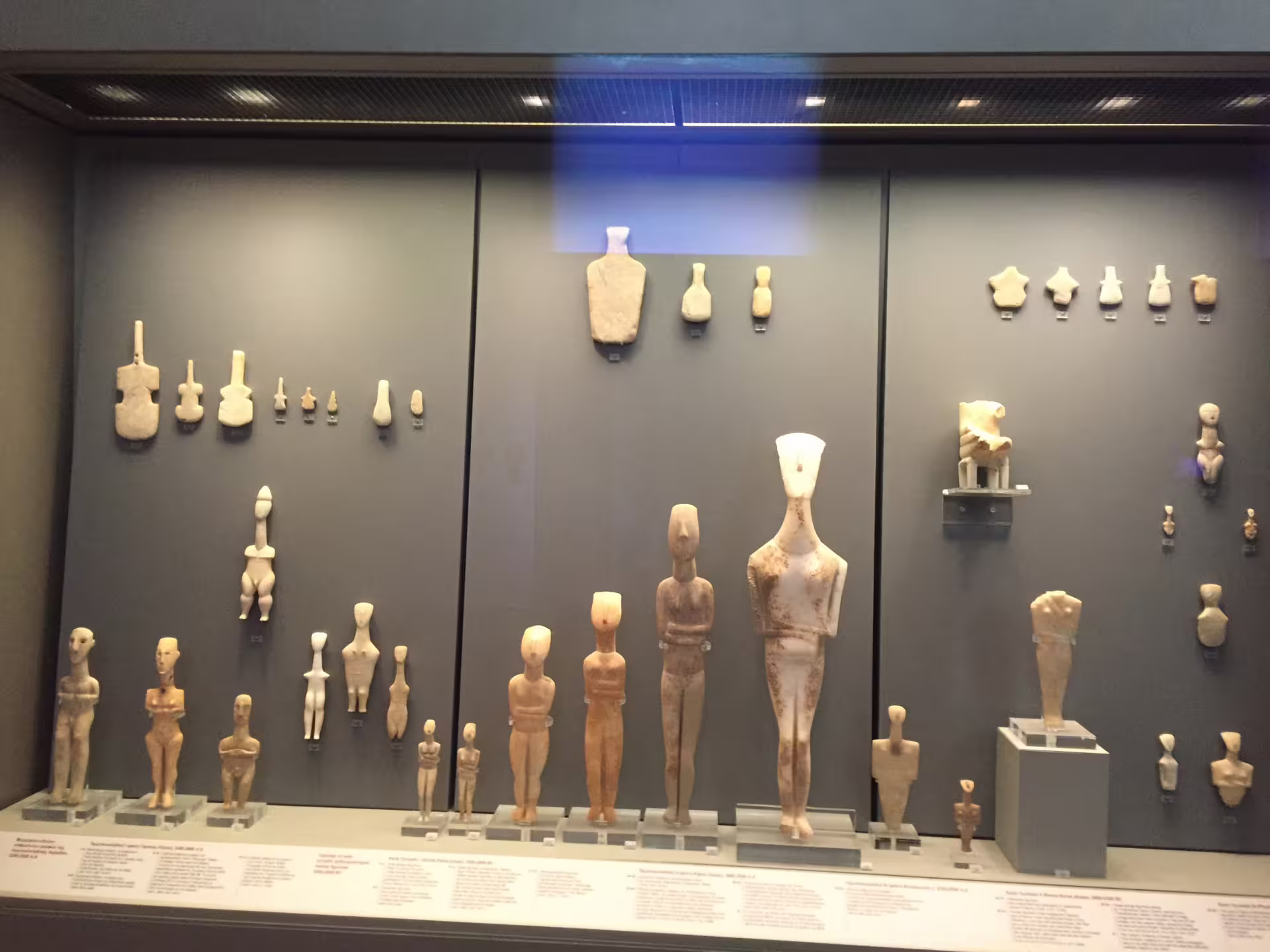 Cycladic figurines display case at the National Archaeological Museum of Athens on a private tour