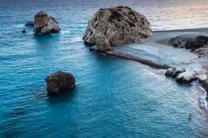 Turquoise Cyprus coastline with sea rocks and quiet bay, scenic stop on authentic Cypriot cultural and wine tour