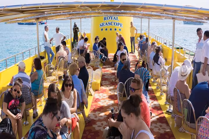 Guests relaxing on the Royal Seascope boat deck in Dahab before the guided Red Sea seascope submarine tour