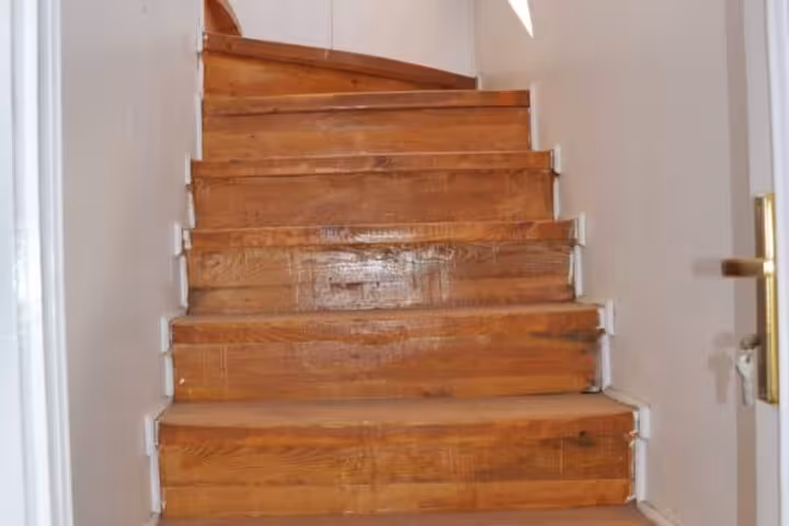 Wooden staircase inside traditional dahabiya boat on Egypt Nile cruise 5 days 4 nights luxury tour