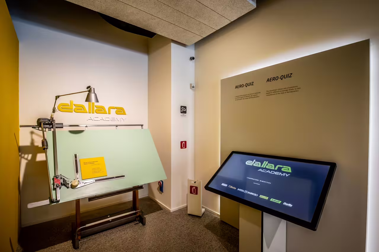 Dallara Academy's aero-dynamics quiz station, offering hands-on learning in motorsport excellence, Parma.