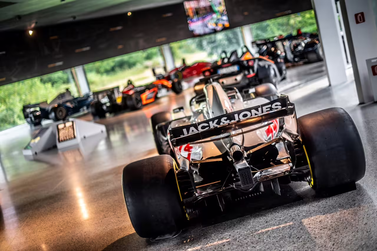 Experience the thrill of racing at Dallara Academy with a stunning display of advanced motorsport vehicles.