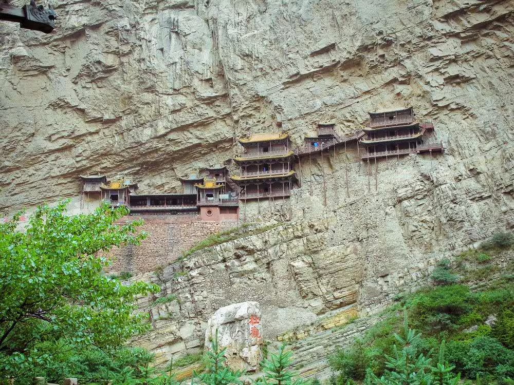 Explore the stunning Hanging Monastery perched on a cliffside in Datong, a must-see on your private city tour.