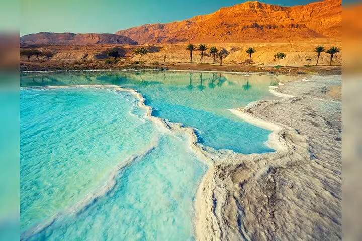 Turquoise Dead Sea salt pools and desert cliffs, scenic stop on 13-day Egypt Jordan and Jerusalem tour