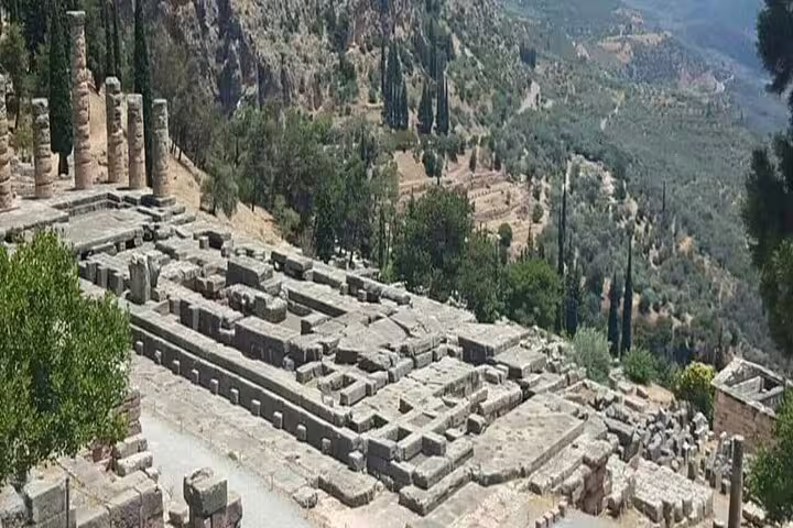 Delphi archaeological site ruins and terraces on a private full-day tour from Athens with scenic views