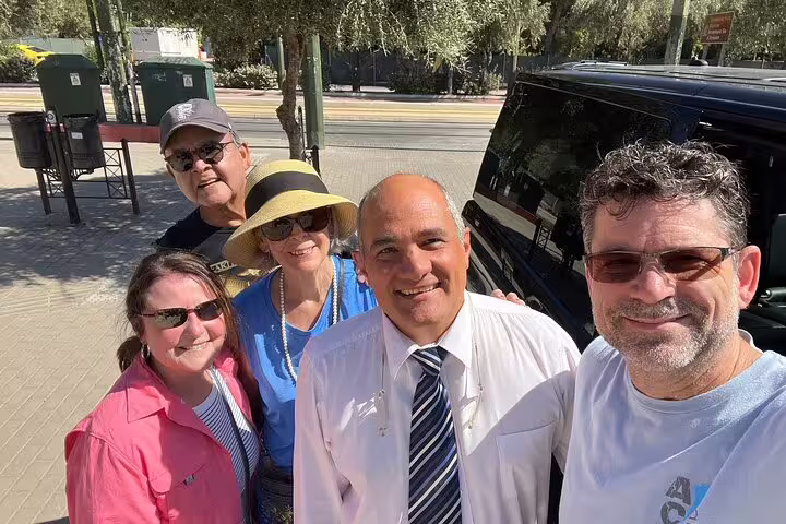 Small group with private driver beside van in Athens, starting Delphi and Meteora private day trip with dinner