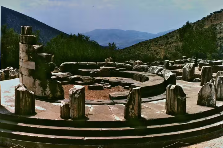 Tholos of Athena Pronaia ruins at Delphi, scenic stop on a private guided day trip from Athens