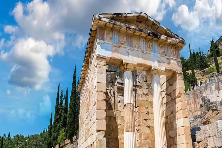 Delphi Treasury of the Athenians at the archaeological site, a highlight on a private day tour from Athens
