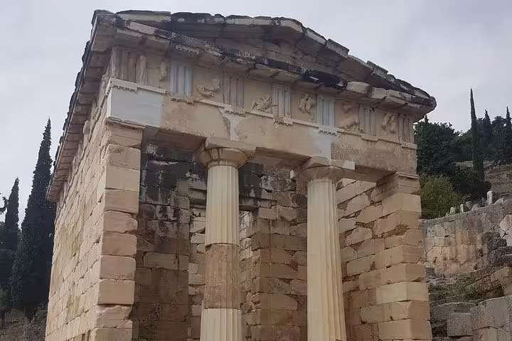 Treasury of the Athenians at Delphi Archaeological Site, highlight of guided small group day tour from Athens