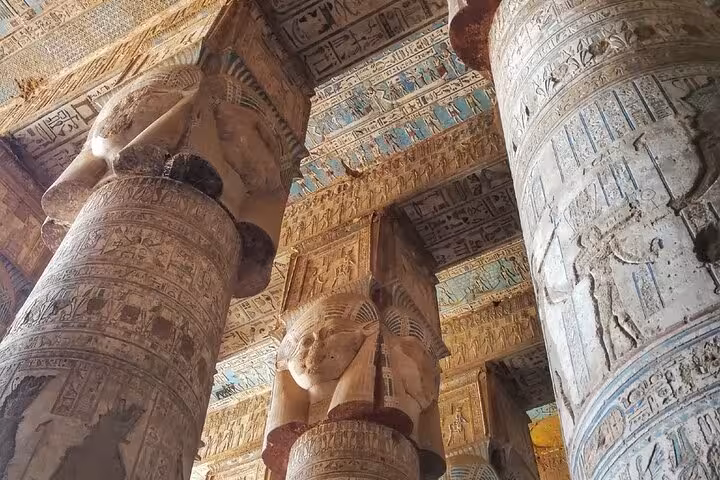 Painted columns with Hathor capitals inside Dendera Temple on Abydos day trip from Hurghada, Egypt