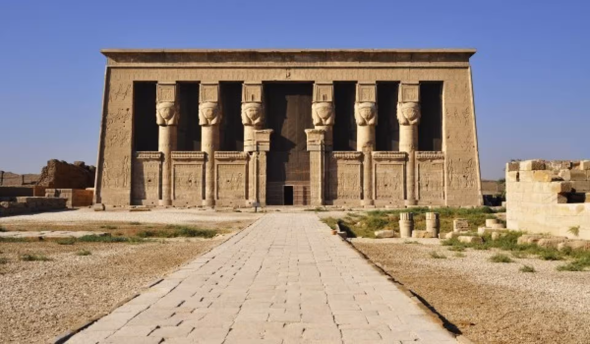 Front view of Dendera Temple of Hathor entrance, a highlight of the full-day Dendera and Abydos temples excursion
