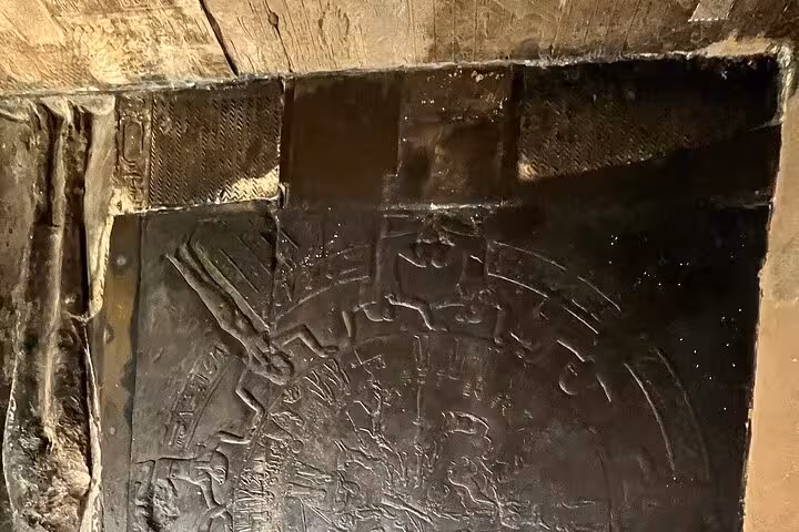 The Dendera Zodiac, a stunning circular relief, exemplifies ancient Egyptian astronomical knowledge at Dendera Temple.