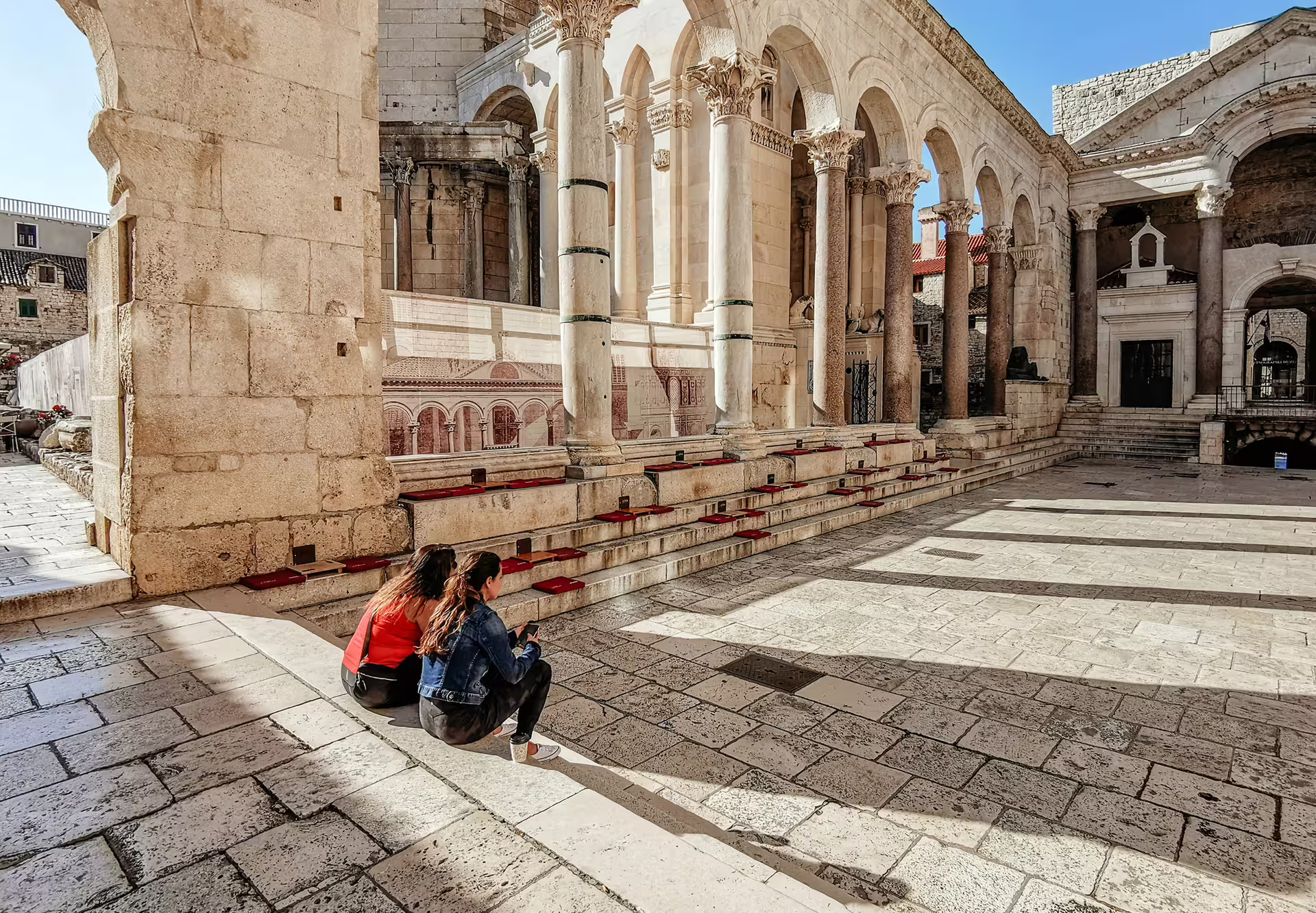 Peristyle of Diocletian’s Palace in Split with stone columns, key stop on a self-guided walking tour audioguide