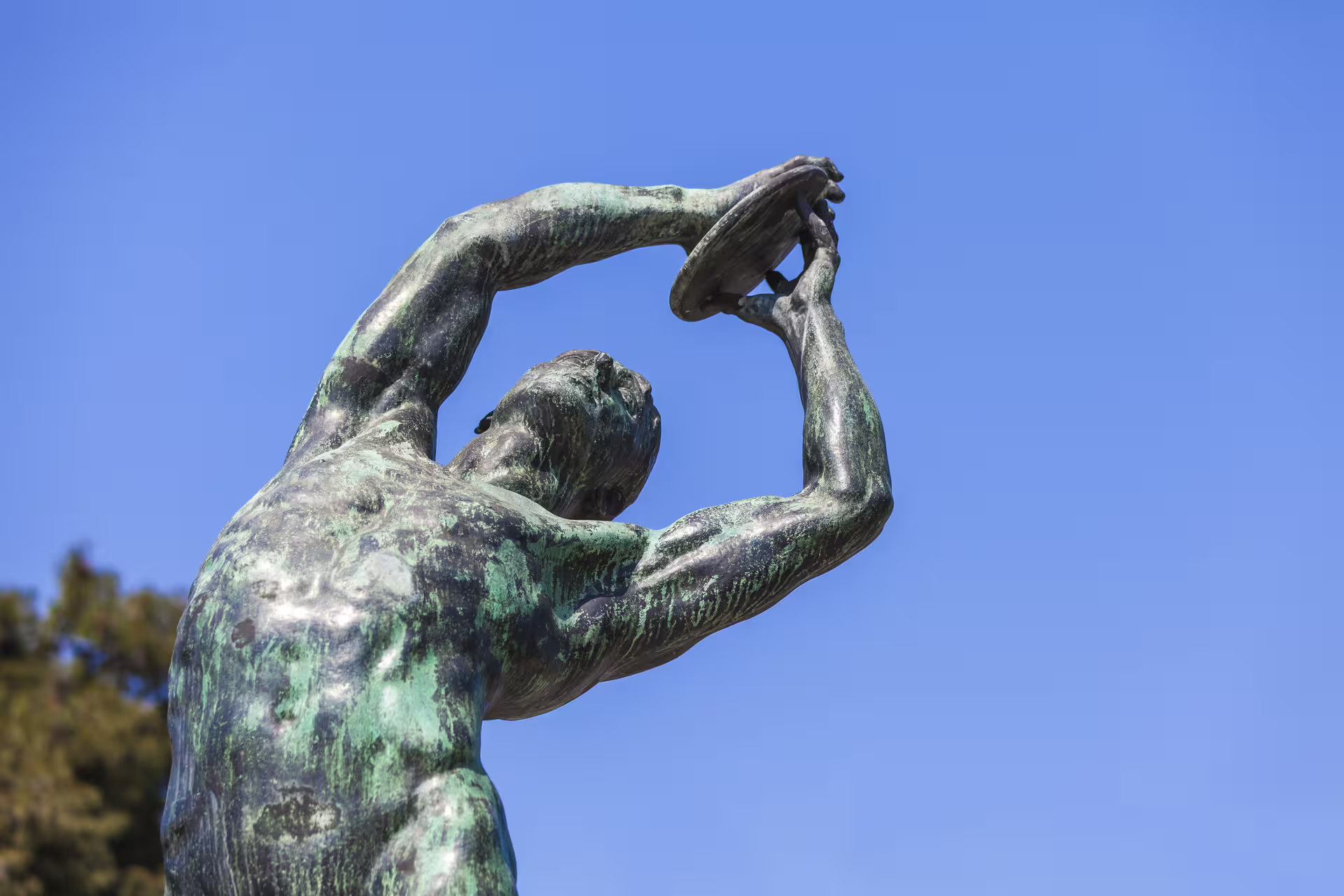 Close-up of Discobolus-style statue in Athens, seen on an Acropolis small-group sightseeing tour with tickets included