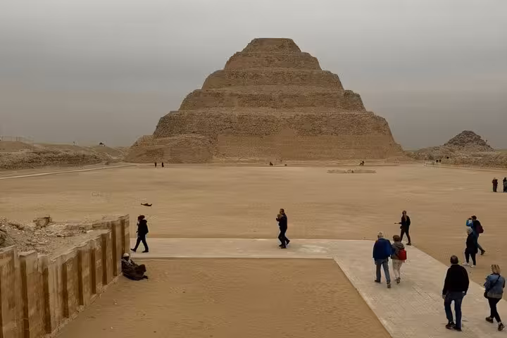 Wide view of Djoser Step Pyramid at Saqqara necropolis, highlight stop on private Memphis and Dahshur tour