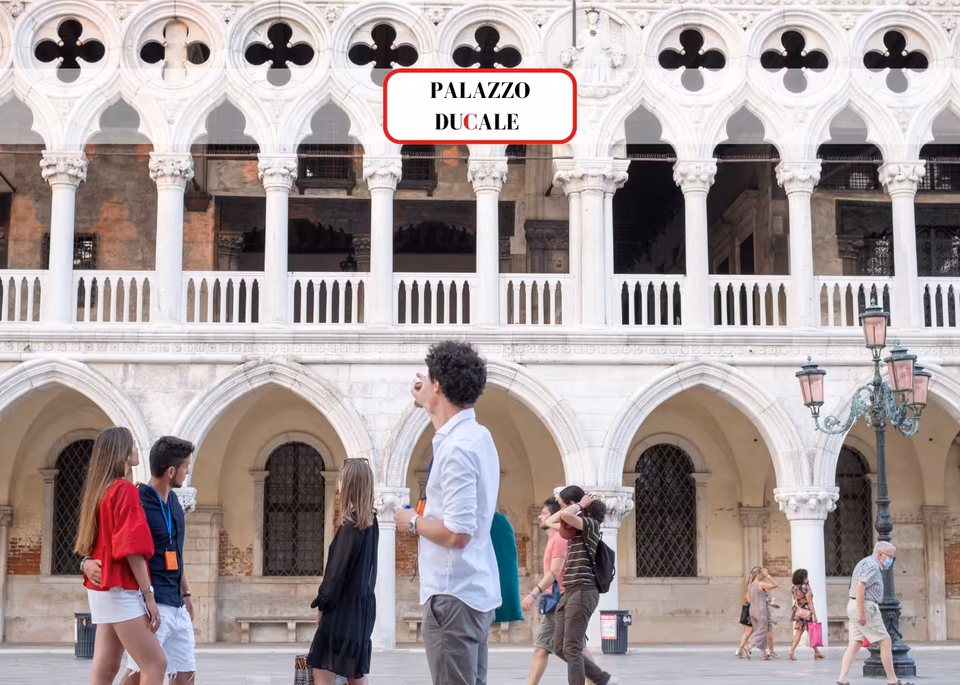 Visitors admiring the Gothic architecture of Doge’s Palace, a highlight of Venice’s must-see attractions.