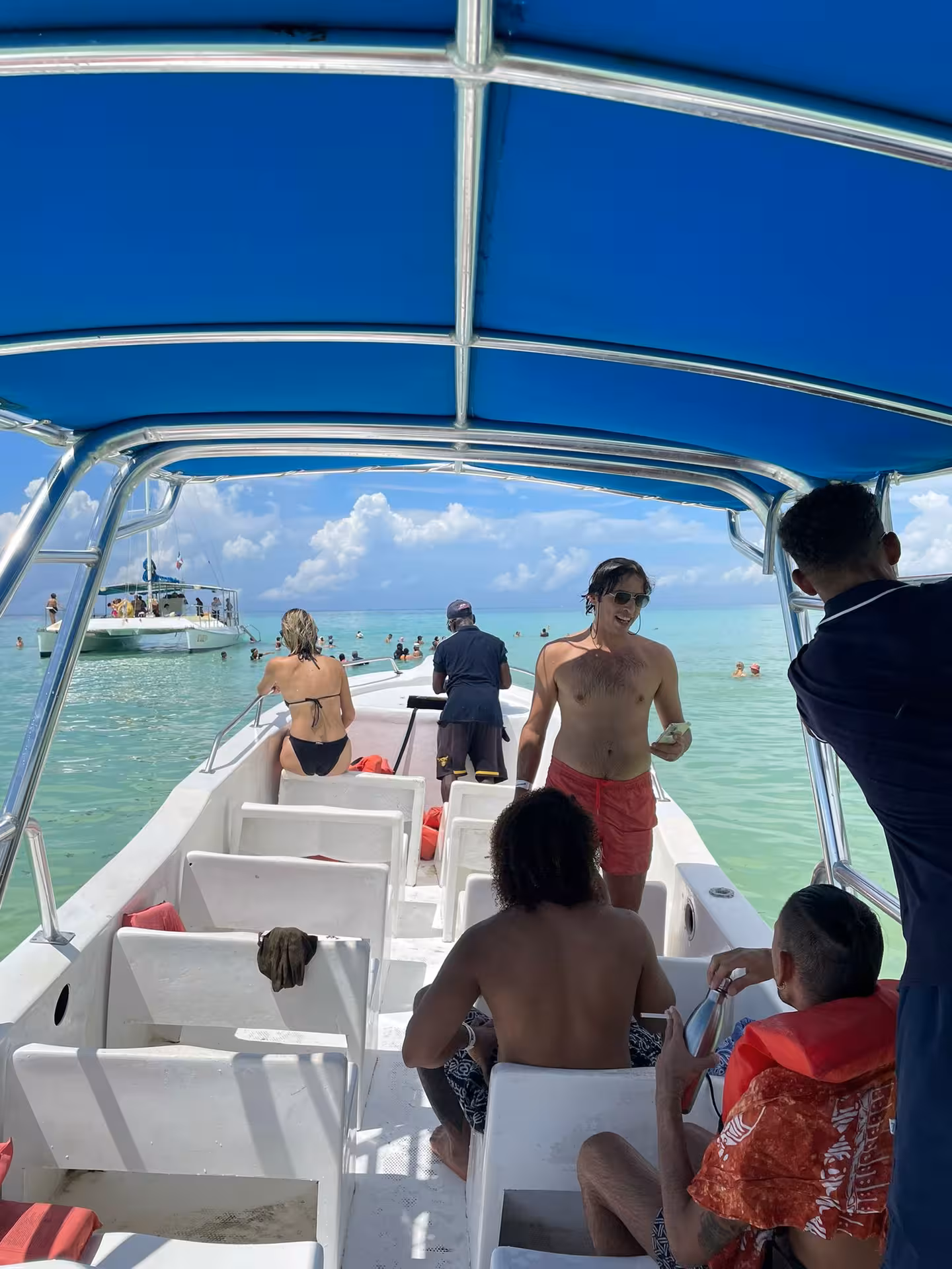 Boat excursion to shallow turquoise waters in the Dominican Republic, with snorkeling and beach time in paradise