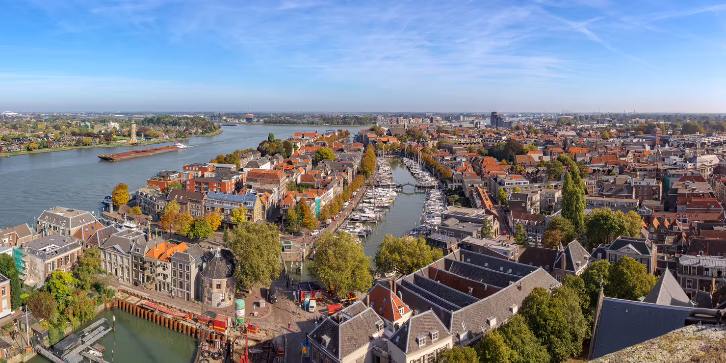 Panoramic view of Dordrecht harbor and waterways, ideal for a 1-day walking tour with multilingual audioguide