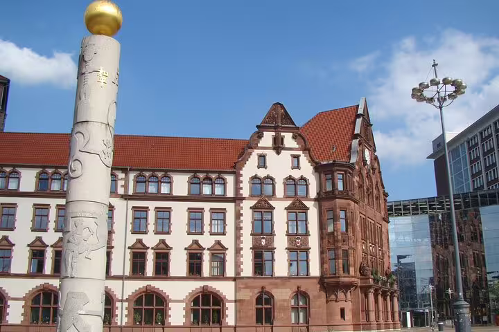 Dortmund City Hall and Friedensplatz column, key stop on a self-guided scavenger hunt highlights tour