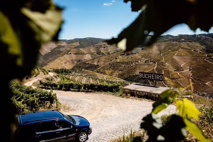 4x4 vehicle on scenic Douro Valley vineyard trail, perfect for private adventure tours in Portugal.