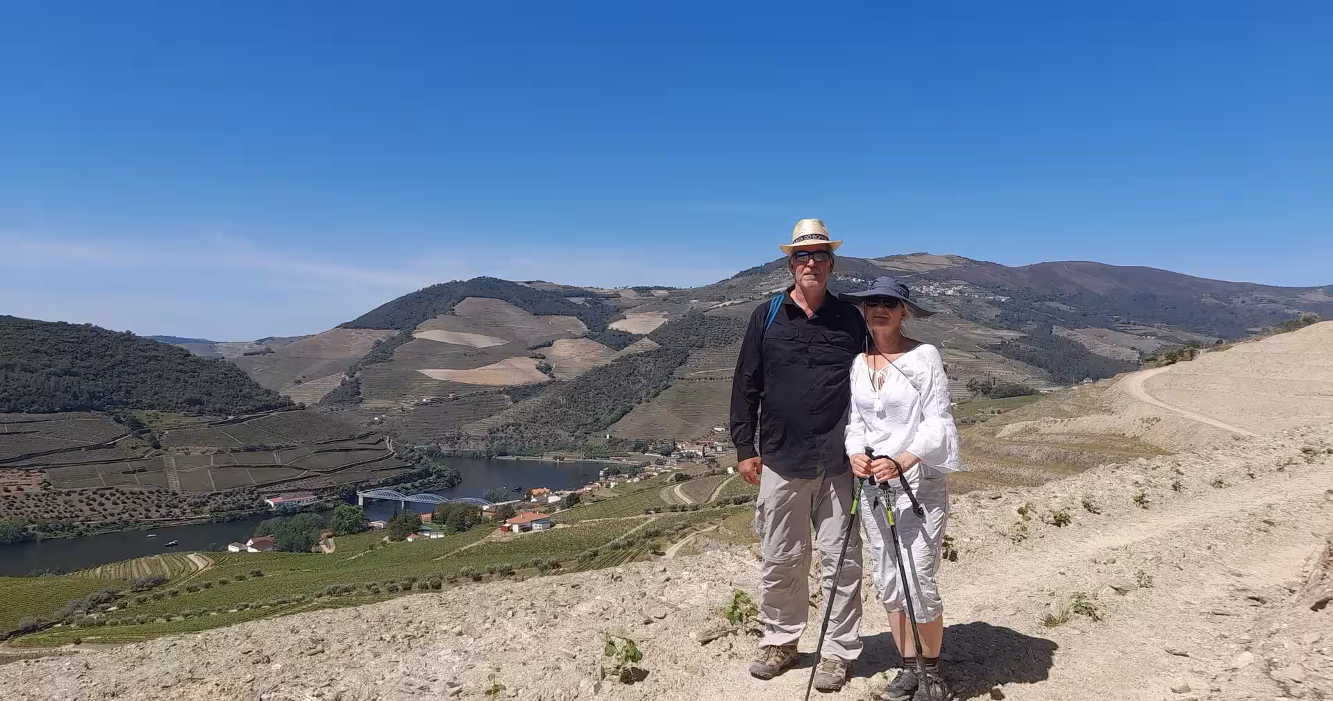 Hikers at Douro Valley viewpoint above river and vineyards, small-group hike from Braga with lunch and wine