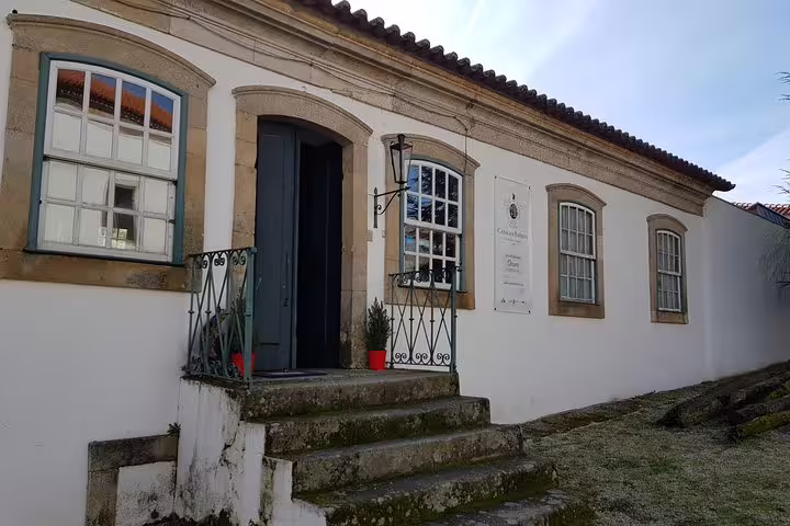 Charming entrance to a traditional Douro Valley vineyard building, part of a scenic wine tour route.