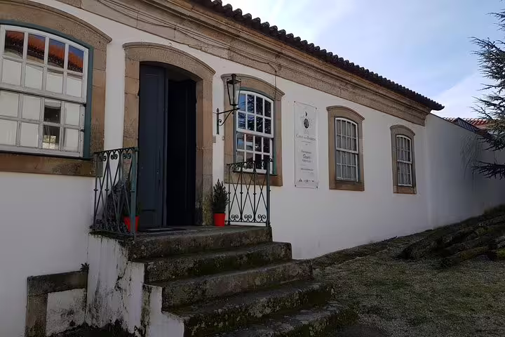 Charming entrance of a historic Douro Valley winery, perfect for a vineyard tour and wine tasting experience.