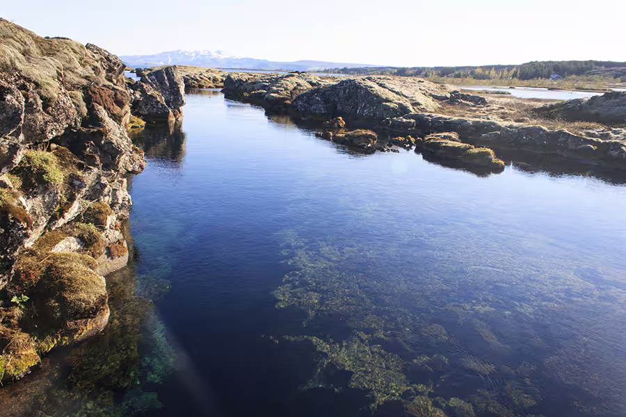 Crystal-clear waters of Silfra fissure in Thingvellir National Park, ideal for drysuit snorkeling adventures near Reykjavik.