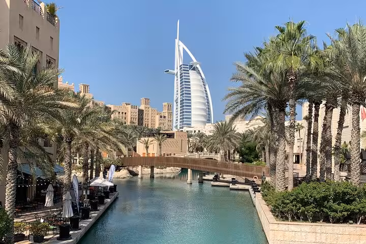 Madinat Jumeirah canal with Burj Al Arab view, Dubai city tour from Ras Al Khaimah with kids free