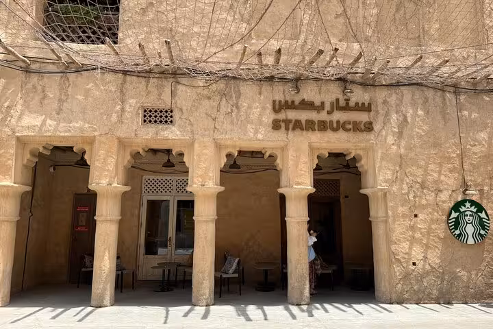 Starbucks café in Al Seef heritage district, featured on Dubai city tour with Ain Dubai entrance