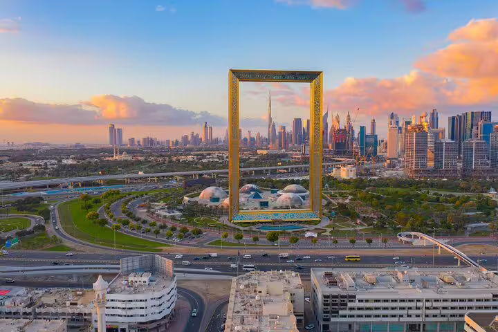 Dubai Frame at sunset with Burj Khalifa skyline, ideal stop on a private full-day customizable sightseeing tour