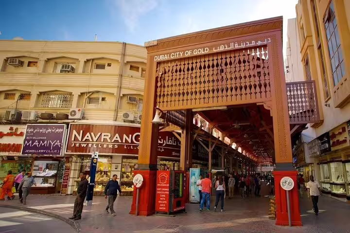 Entrance to Dubai's famous Gold Souk, showcasing vibrant shops and bustling markets on a private city tour.