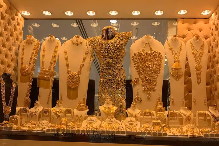 Gold Souk jewelry window display in Dubai, included in private Abu Dhabi to Dubai city tour with fountains show
