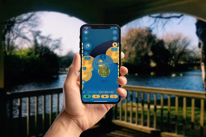 Tourist holds Dublin hidden gems walking tour app near a scenic park pond revealing St Stephens Green secrets