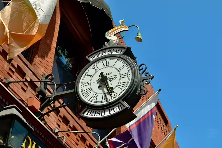 Dublin Square Irish Pub ornate street clock on brick building in San Diego's Gaslamp Quarter