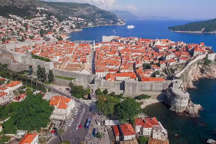 Dubrovnik city walls and red rooftops by the Adriatic, a must-see on an early morning walking group tour