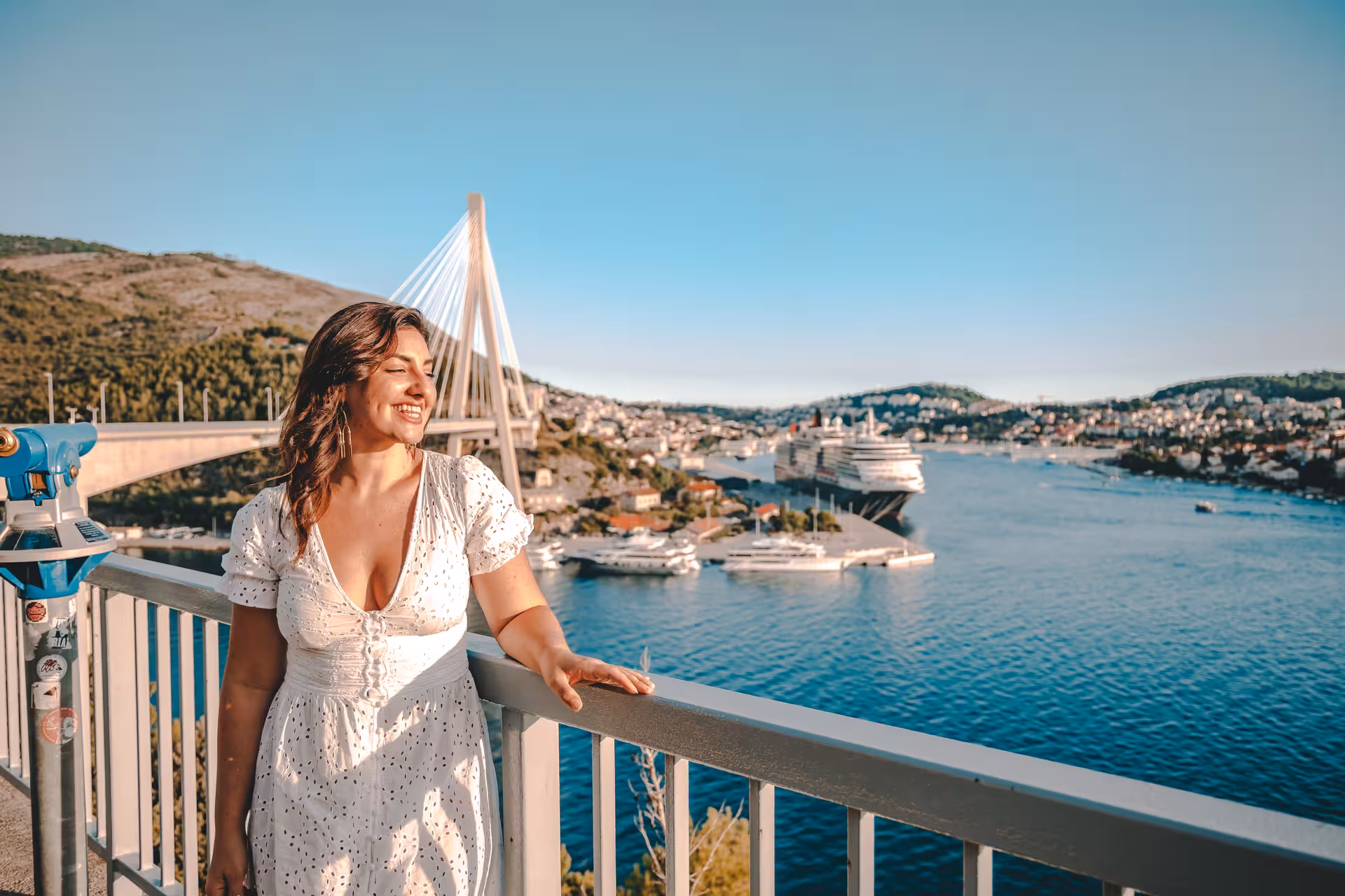 Traveler enjoying panoramic Dubrovnik harbor view near Franjo Tuđman Bridge on a one-day trip from Split