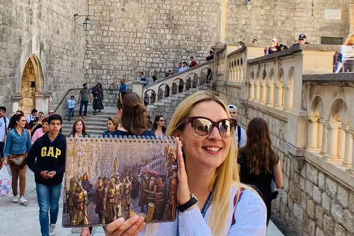 Tour guest at Dubrovnik Old Town walls, comparing scene to King’s Landing on Iron Throne group tour