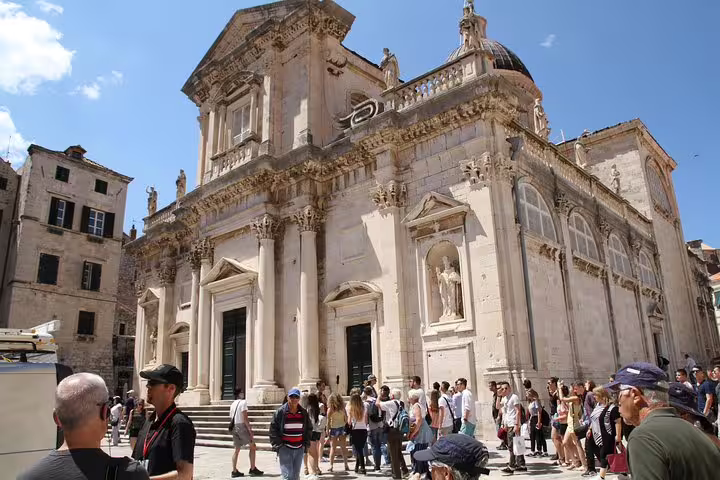 Dubrovnik Old Town cathedral facade with visitors, part of discounted Old Town and Ancient City Walls combo tour