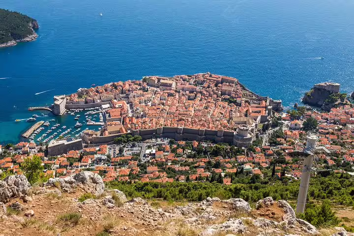 Panoramic view of Dubrovnik Old Town and Adriatic from city walls viewpoint on guided walking group tour