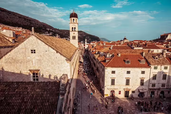 Dubrovnik Old Town Stradun and bell tower view, key stop on Ancient City Walls & Wars walking tour
