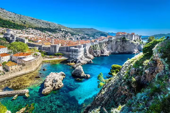 Panoramic Dubrovnik Old Town walls and Adriatic coast view, highlights tour with local wine tasting