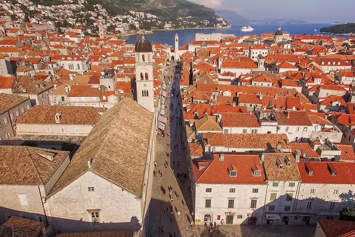 Stradun street and bell tower in Dubrovnik Old Town, featured on the Early Bird Walking Group Tour