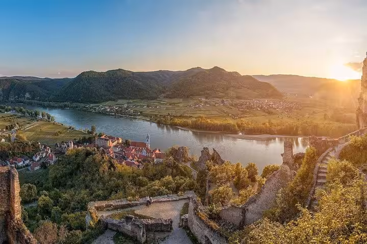 Sunset view over the Danube and Wachau vineyards from Dürnstein Castle ruins on a private tour from Vienna