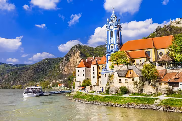 Dürnstein Abbey and Danube riverfront in Wachau Valley on a private tour from Vienna with wine tasting