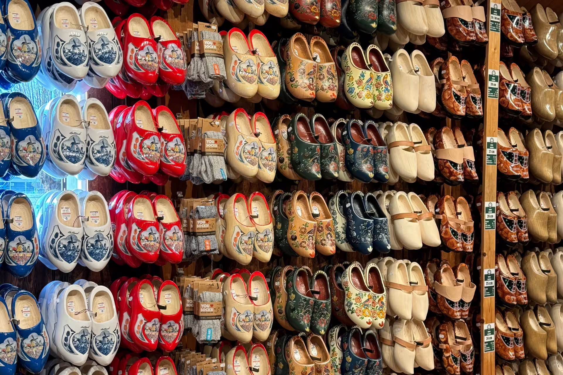 Colorful Dutch clogs display at Zaanse Schans, a popular stop on Amsterdam to Giethoorn tour with canal cruise