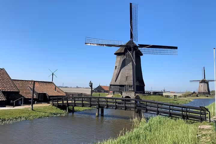 Iconic Dutch windmill by waterways in the countryside, private tour from Amsterdam to explore the North