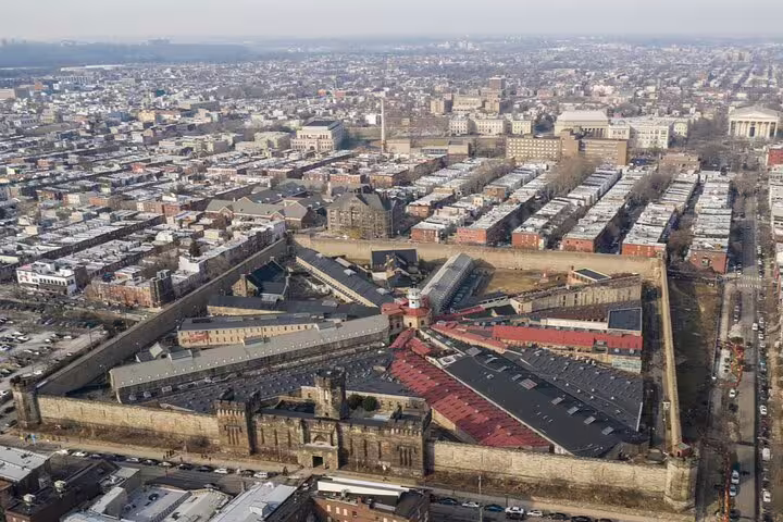 Aerial view of Eastern State Penitentiary surrounded by Philadelphia row homes and city streets